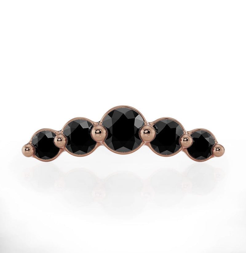 Front view of 14K rose gold black diamond climber charm highlighting warm tone against black stones