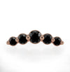 14K rose gold mini climber threadless stud end featuring 5 black diamond stones, front view