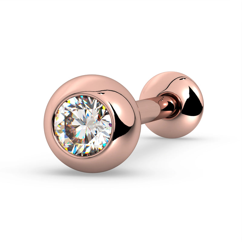 14K rose gold tongue barbell with white sapphire bezel setting, angled view showing sparkle and warm tone