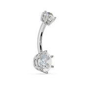 14k white gold moissanite belly ring showing curved barbell and prong detail, angled side view