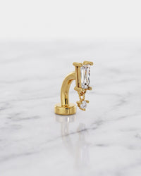 Floating navel rings - 14k yellow gold baguette drop floating belly ring on white marble