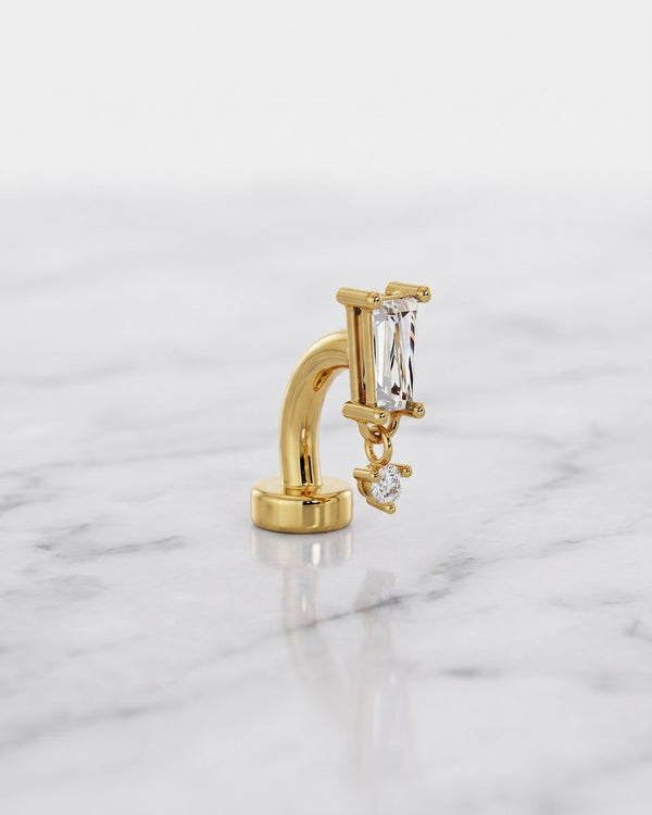 Floating navel rings - 14k yellow gold baguette drop floating belly ring on white marble