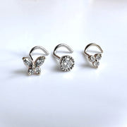 Trinity diamond nose ring shown alongside two other diamond nose studs for style comparison