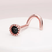 14k rose gold black diamond perlage nose ring twist style on white display, angled side view