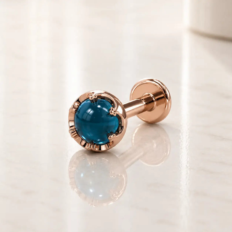 Reina London Blue Topaz Nose Ring in 14K Rose Gold with crown-set London Blue Topaz - for nostril piercings