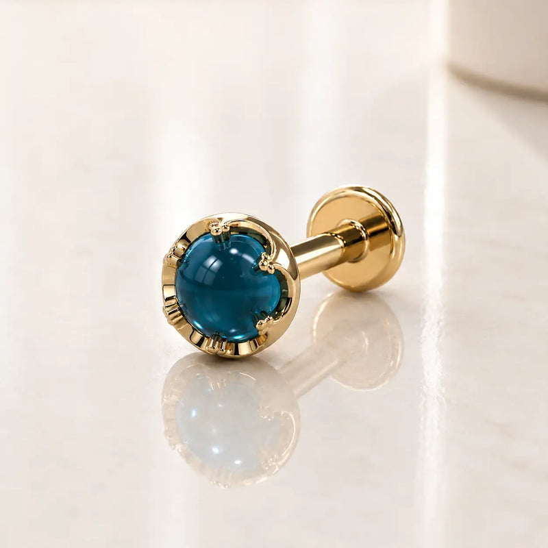 Reina London Blue Topaz Nose Ring in 14K Yellow Gold with crown-set London Blue Topaz - for nostril piercings