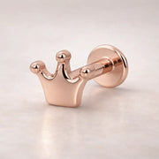 14k rose gold crown flat back labret stud, angled view showing warm pink-gold polished crown charm