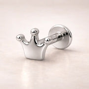 14k white gold crown flat back labret stud, angled view highlighting polished silver-tone finish
