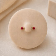 Red gemstone nipple barbell on a model
