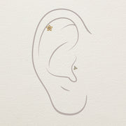 14k yellow gold diamond daisy stud end shown in illustrated helix and conch ear piercing placement