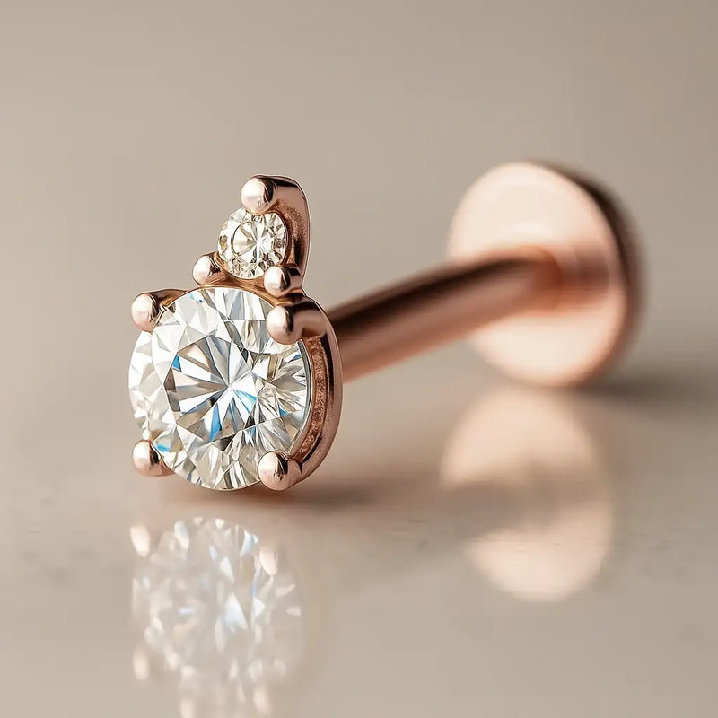 14k rose gold flat back labret with round CZ and diamond accent in prong setting, side profile view