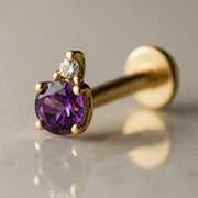 14k yellow gold flat back labret with round amethyst and diamond accent, angled side view