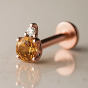 14k rose gold citrine and diamond accent flat back labret, angled view showing warm-toned setting