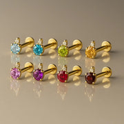 14k yellow gold diamond accent flat back labrets in eight gemstone colors including pink tourmaline, group display