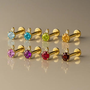 14k yellow gold diamond accent flat back labrets in eight gemstone colors including pink tourmaline, group display