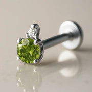 14k white gold peridot and diamond flat back labret, angled side view showing post and flat backing