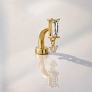 14k yellow gold baguette floating belly ring with crystal CZ dangle, styled shot with reflection