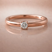 14K rose gold diamond side-set seam ring hoop, angled view showing prong setting and reflection