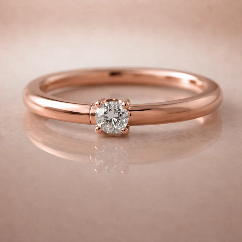 14K rose gold diamond side-set seam ring hoop, angled view showing prong setting and reflection