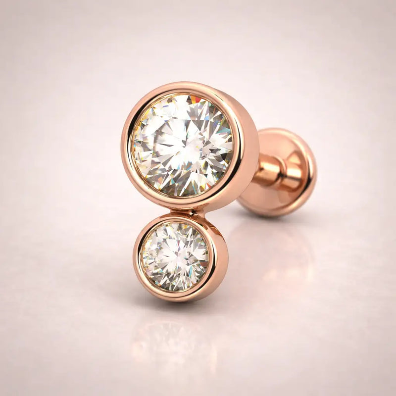 14k rose gold diamond bubble flat back stud, angled view showing warm tone bezel setting with two diamonds