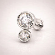 14k white gold diamond bubble flat back stud, angled view highlighting polished bezel settings and post