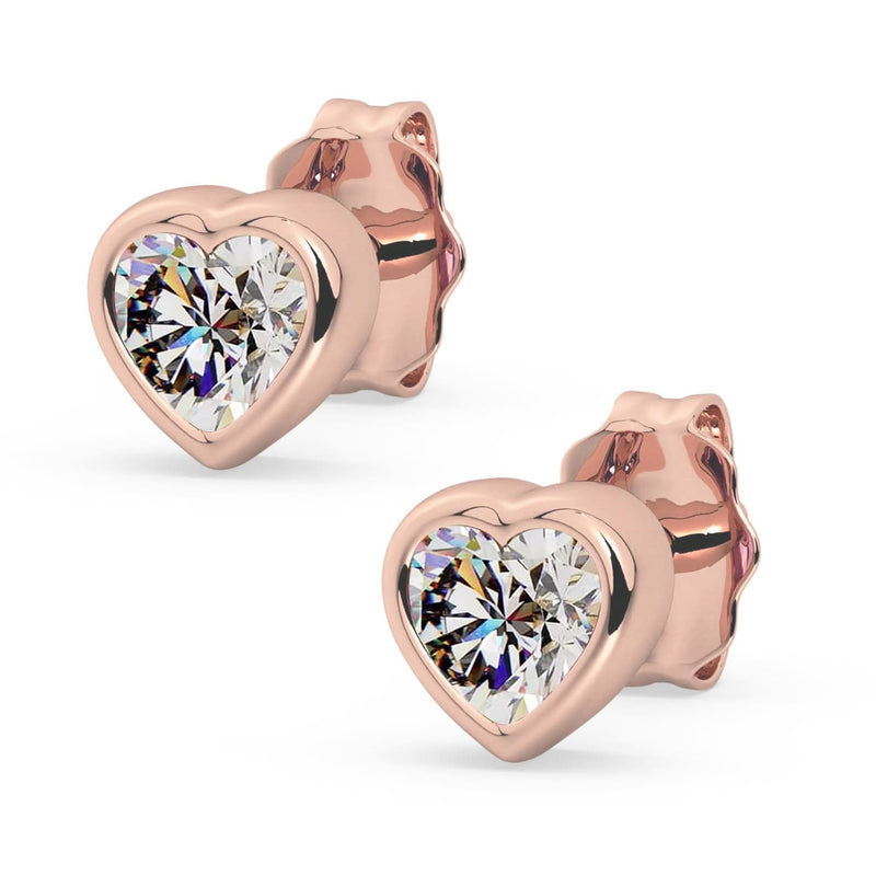14k rose gold diamond heart stud earrings pair, product render with brilliant diamonds in rose gold heart bezels