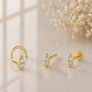 14K yellow gold double diamond nose ring in twist, bone, and straight post styles side by side
