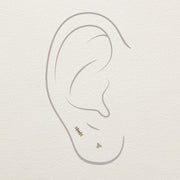 Illustration of baguette duo diamond stud end placement in helix and lobe ear piercings