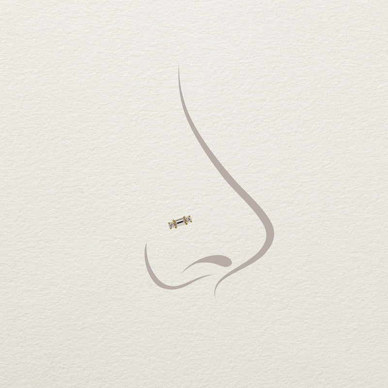 Illustration of 14k gold baguette diamond stud end placement on a nose piercing diagram