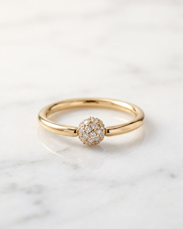 Captive bead rings - 14k yellow gold fixed bead ring with diamond pave ball on white marble