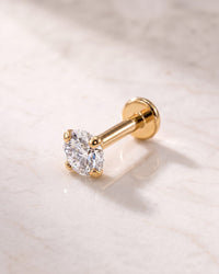 Diamond flat back stud earrings - 3mm low-set prong diamond 14k yellow gold flat back stud on white marble