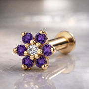 14k yellow gold purple CZ flower flat back labret with clear center stone, angled product view