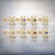 14K yellow gold CZ flower nose bone collection showing all 8 birthstone center color options