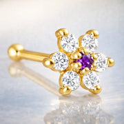 14K yellow gold flower nose bone with purple amethyst CZ center and clear CZ petals, angled view