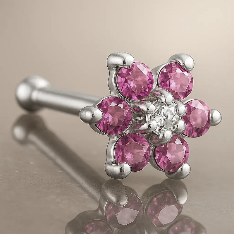 14K white gold flower nose bone with pink CZ petals and clear CZ center, angled product view