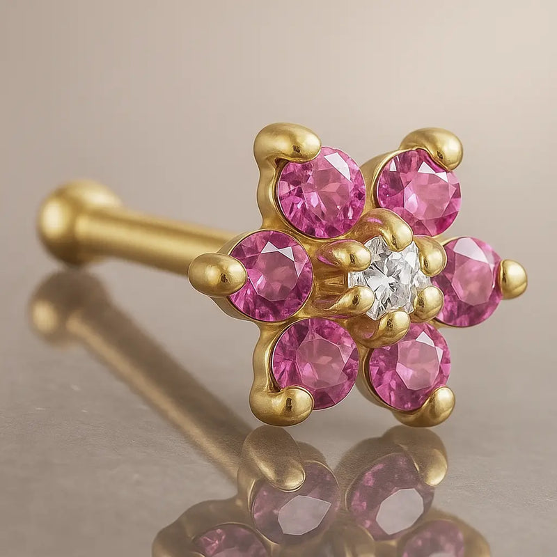 14K yellow gold flower nose bone with pink CZ petals and clear CZ center, angled product view