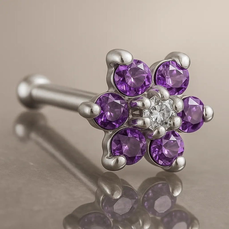 14K white gold flower nose bone with purple CZ petals and clear CZ center, angled product view