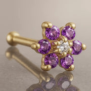 14K yellow gold flower nose bone with purple CZ petals and clear CZ center, angled product view