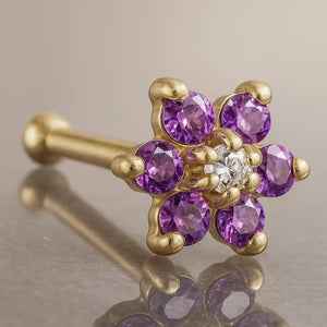 14K yellow gold flower nose bone with purple CZ petals and clear CZ center, angled product view
