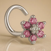 14K white gold flower nose twist with pink CZ petals and clear center CZ, front angled view