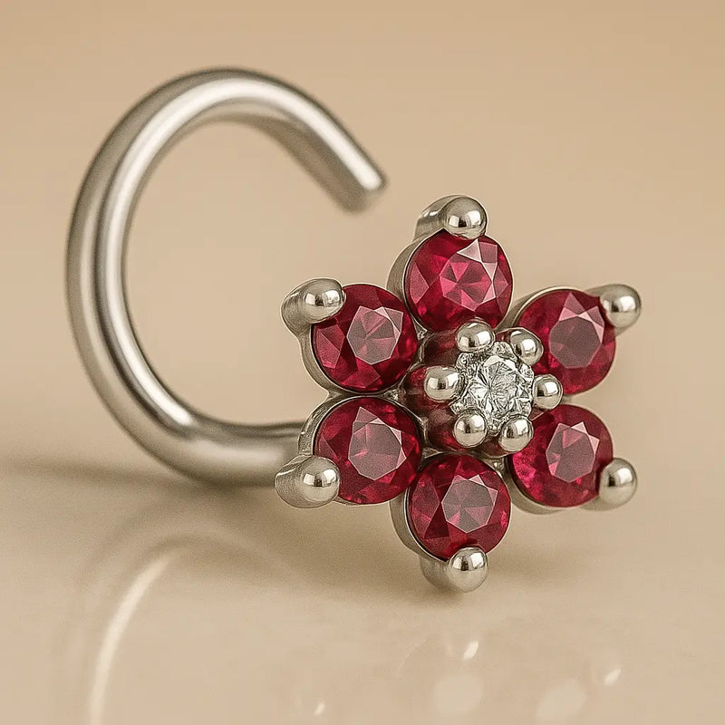 14K white gold CZ flower nose twist, red petals with clear center, twist post detail visible