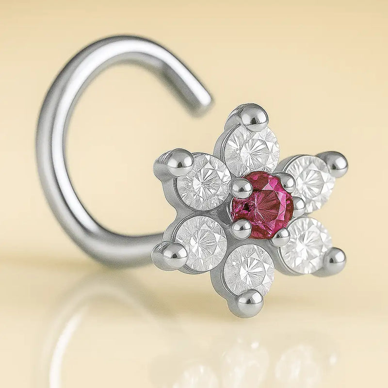 14K white gold CZ flower nose ring twist with pink tourmaline center CZ, angled close-up view