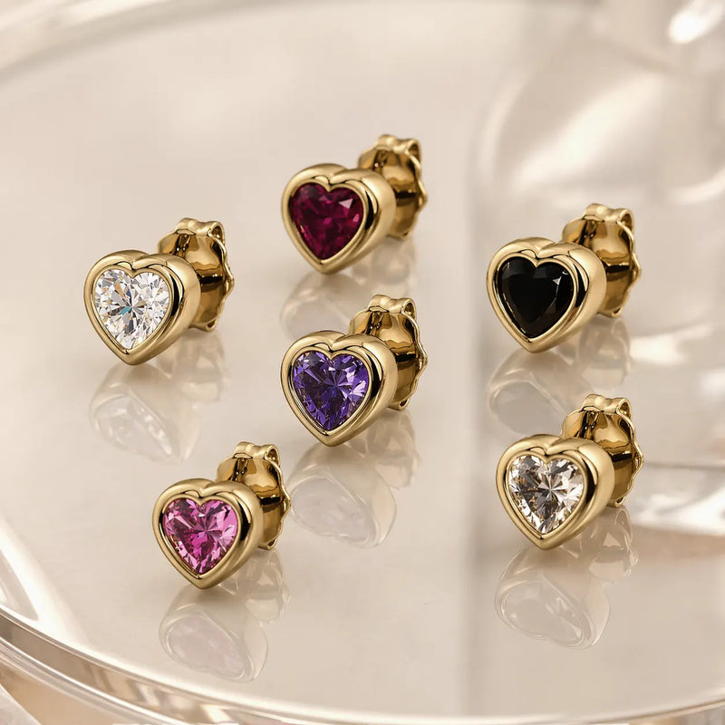 14k yellow gold gemstone heart stud earrings in six stone options: diamond, pink sapphire, amethyst, rhodolite, onyx, white sapphire