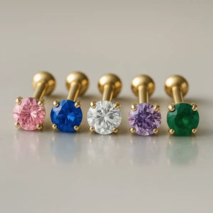 Five 14k yellow gold 5mm birthstone cartilage studs in pink, blue, clear, lavender, and green
