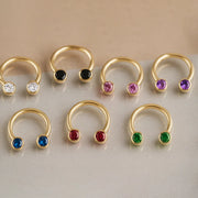 14k yellow gold CZ circular barbells in seven colors including green, blue, red, pink, purple, black, and clear