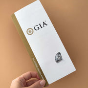 GIA Diamond Grading Report booklet included with this GIA certified diamond nipple barbell