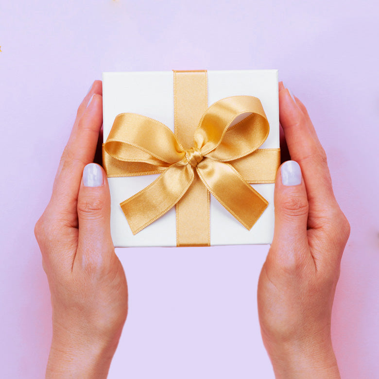 Hands holding gift box