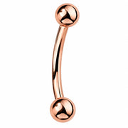 Solid 14k gold curved barbell for navel and eyebrow piercings