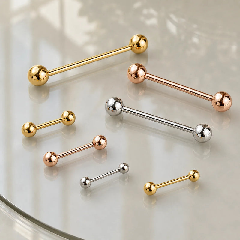 Solid 14k gold straight barbells lifestyle photo