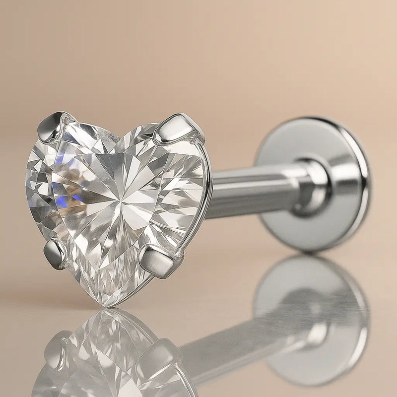14k white gold flat back labret with prong-set heart CZ, angled view showing flat disc and post
